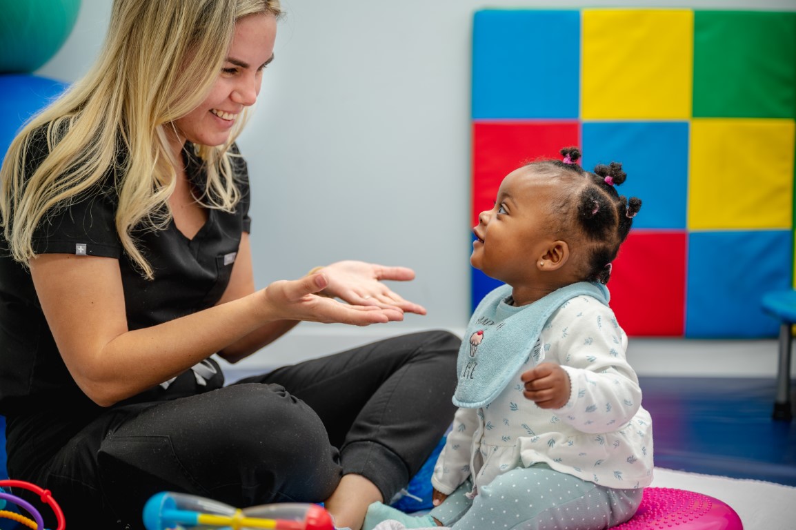 Pediatric nurse providing specialized care to a child at Peek A Boo Pediatric Care, Hollywood, FL